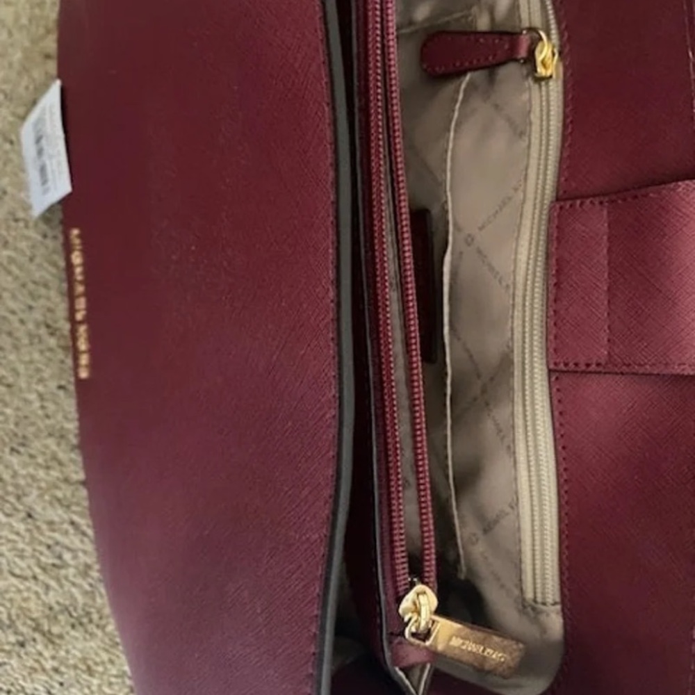 Beautiful deep cherry red brand new Michael Kors purse!